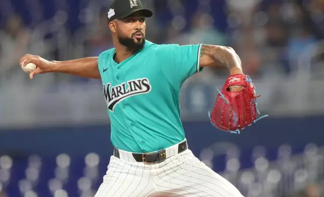 Miami Marlins starting pitcher Sandy Alcantara (22) aims a pitch during the first inning of a baseball game against the Tampa Bay Rays Sunday, June 7, 2026, in Miami. (AP Photo/Marta Lavandier)