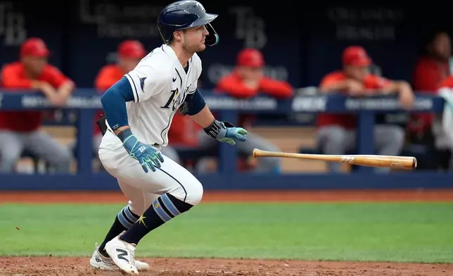 Tampa Bay Rays' Ben Williamson drops his bat after his RBI single off Los Angeles Angels pitcher Drew Pomeranz during the seventh inning of a baseball game Sunday, May 31, 2026, in St. Petersburg, Fla. (AP Photo/Chris O'Meara)
