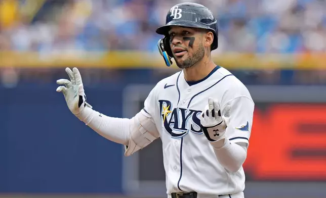 Tampa Bay Rays' Victor Mesa Jr. reacts after his RBI single off Los Angeles Angels pitcher Jack Kochanowicz during the third inning of a baseball game Sunday, May 31, 2026, in St. Petersburg, Fla. (AP Photo/Chris O'Meara)
