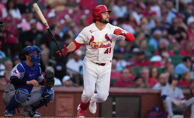 St. Louis Cardinals' Alec Burleson watches his RBI single during the first inning of a baseball game against Texas Rangers Wednesday, June 3, 2026, in St. Louis. (AP Photo/Jeff Roberson)
