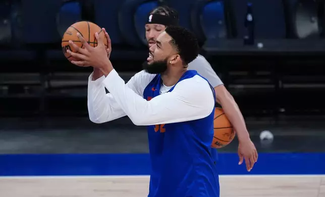 New York Knicks center Karl-Anthony Towns runs drills prior to Game 3 of the NBA Finals basketball series against the San Antonio Spurs, Sunday, June 7, 2026, in New York. (AP Photo/Ross D. Franklin)
