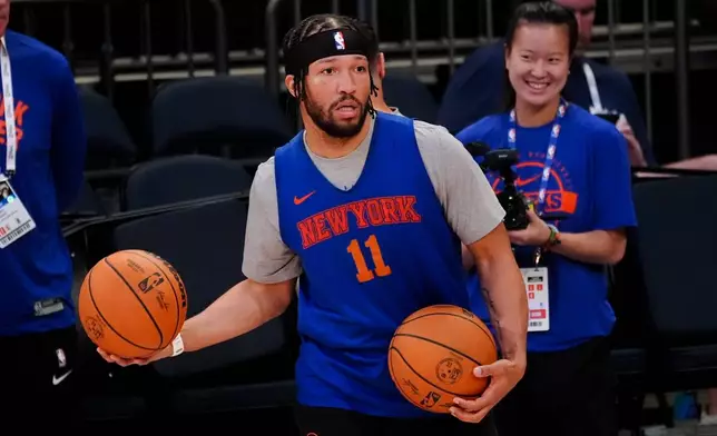 New York Knicks guard Jalen Brunson runs drills prior to Game 3 of the NBA Finals basketball series against the San Antonio Spurs, Sunday, June 7, 2026, in New York. (AP Photo/Ross D. Franklin)