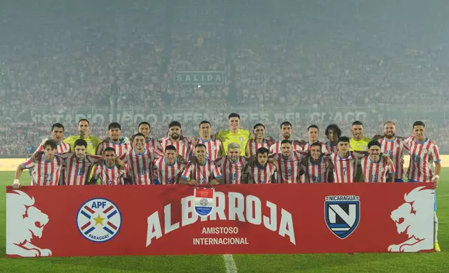 Paraguay's team pose for a group photo prior to an international friendly soccer match against Nicaragua in Asuncion, Paraguay, Friday, June 5, 2026. (AP Photo/Jorge Saenz)