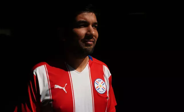 Rodrigo Valdez wears a team Paraguay soccer jersey as he poses for a picture Friday, June 5, 2026, in San Diego. (AP Photo/Gregory Bull)