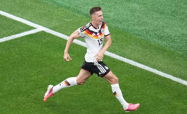 Germany's Nico Schlotterbeck (15) celebrates after scoring his side's second goal during the World Cup Group E soccer match between Germany and Curacao in Houston, Sunday, June 14, 2026. (AP Photo/Eric Smith)