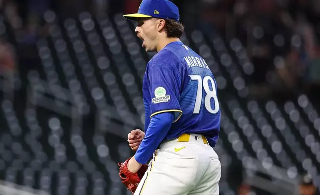 Minnesota Twins pitcher Andrew Morris celebrates his teams win against the St. Louis Cardinals during the ninth inning of a baseball game, Friday, June 12, 2026, in Minneapolis. (AP Photo/Matt Krohn)