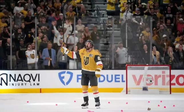 Vegas Golden Knights right wing Mark Stone celebrates after the Golden Knights won in the second overtime in Game 3 of the NHL hockey Stanley Cup Final series against the Carolina Hurricanes, Saturday, June 6, 2026, in Las Vegas. (AP Photo/John Locher)