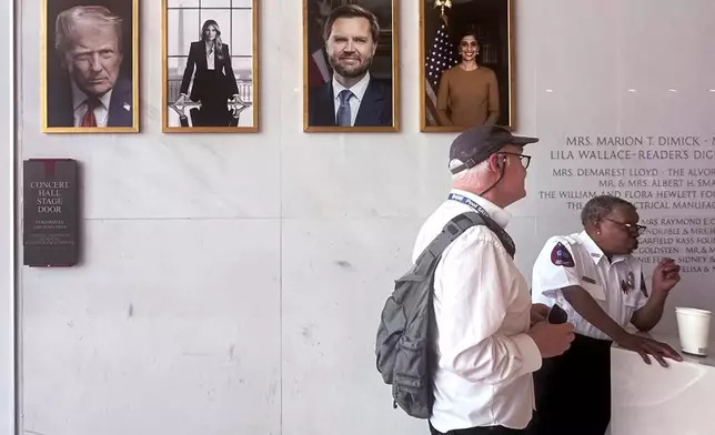 Portraits of President Donald Trump, from left, first lady Melania Trump, Vice President JD Vance and second lady Usha Vance are displayed on the walls of the The John F. Kennedy Center for the Performing Arts lobby, Friday, June 5, 2026, in Washington. (AP Photo/Manuel Balce Ceneta)