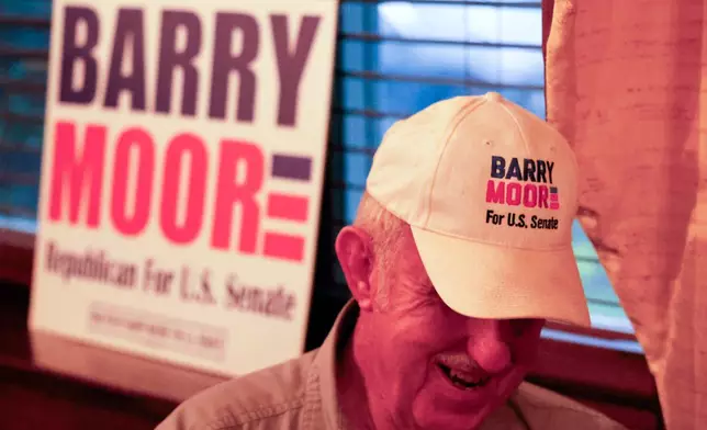 Supporters gather for Republican candidate for U.S. Senate Barry Moore at a watch party at the Rawls Hotel, Tuesday, June 16, 2026, in Enterprise, Ala. (AP Photo/Butch Dill)