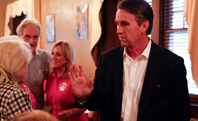 Republican candidate for U.S. Senate Barry Moore greets guest at his watch party at the Rawls Hotel, Tuesday, June 16, 2026, in Enterprise, Ala (AP Photo/Butch Dill)
