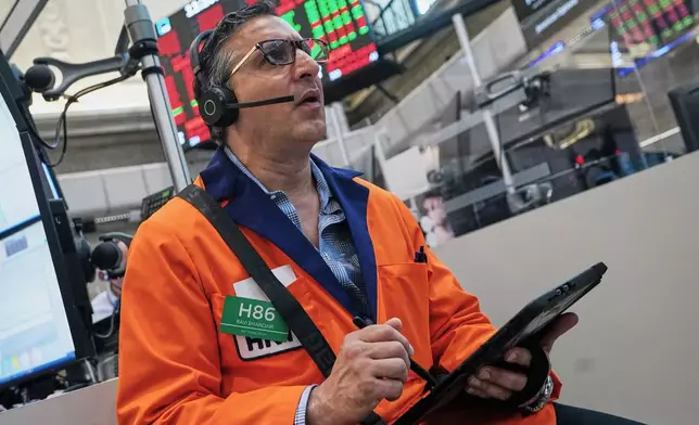 Options trader Ravi Bhandari works on the floor of the New York Stock Exchange, Wednesday, June 3, 2026. (AP Photo/Richard Drew)