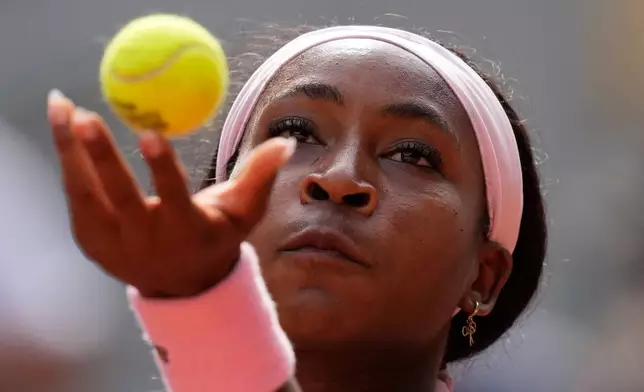 Coco Gauff of the U.S. serves to Anastasia Potapova of Austria during their third round women's singles tennis match at the French Open tennis tournament in Paris, Saturday, May 30, 2026. (AP Photo/Christophe Ena)