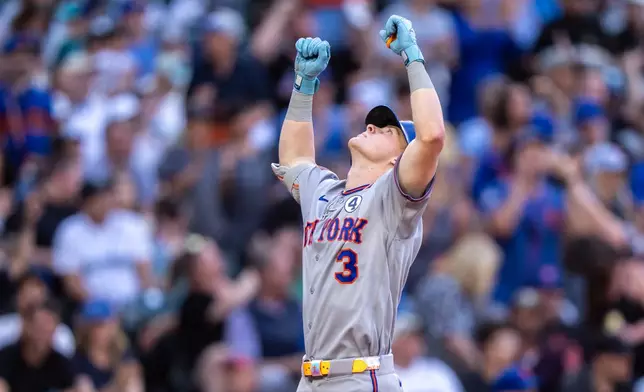 New York Mets Carson Benge celebrates after hitting a two-run home run during the third inning of a baseball game against the Seattle Mariners, Tuesday, June 2, 2026, in Seattle. (AP Photo/Stephen Brashear)