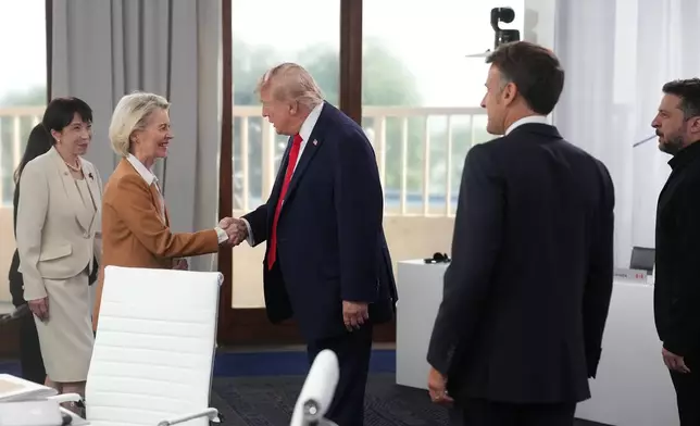 From left, Japan's Prime Minister Sanae Takaichi, European Commission President Ursula von der Leyen, U.S. President Donald Trump, French President Emmanuel Macron and Ukrainian President Volodymyr Zelenskyy during a working session at the G7 summit in Evian-les-Bains, France, Tuesday, June 16, 2026. (AP Photo/Thibault Camus, Pool)
