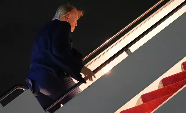 President Donald Trump boards Air Force One, Monday, June 15, 2026, at Joint Base Andrews, Md. (AP Photo/Julia Demaree Nikhinson)