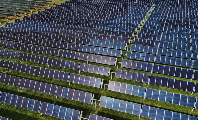 FILE - Solar panels operate April 28, 2026, at a farm in Christiana, Tenn. (AP Photo/Joshua A. Bickel, File)