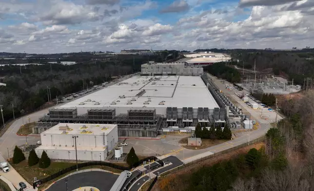 FILE - The Douglas County Google Data Center complex is visible, March 6, 2026, in Lithia Springs, Ga. (AP Photo/Mike Stewart, File)