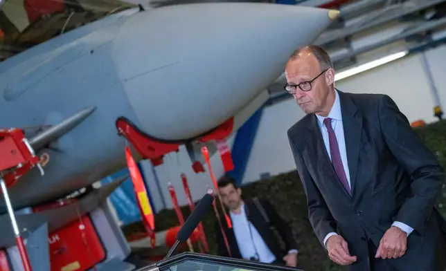 German Chancellor Friedrich Merz visits the German Armed Forces Laage airbase, Germany, Saturday, June 6, 2026. (Stefan Sauer/dpa via AP)