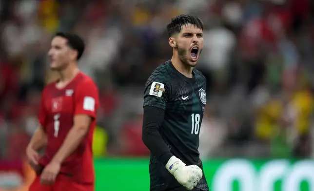 Australia's Patrick Beach celebrates after the World Cup Group D soccer match between Australia and Turkey in Vancouver, Canada, Saturday, June 13, 2026. (Darryl Dyck/The Canadian Press via AP)