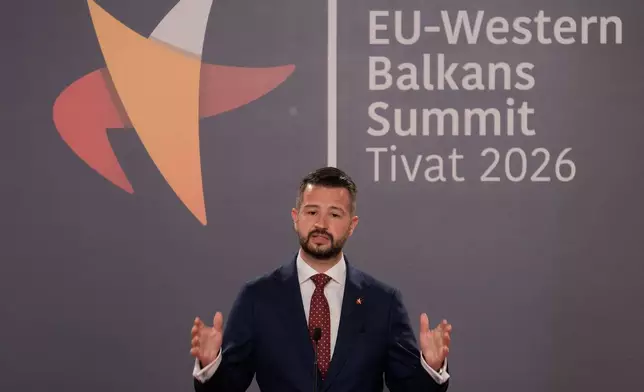 Montenegro's President Jakov Milatovic talks to the media after the EU-Western Balkans summit in the Montenegrin coastal town of Tivat, Friday, June 5, 2026. (AP Photo/Risto Bozovic)