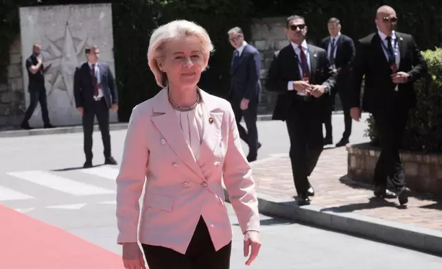 European Commission President Ursula von der Leyen arrives to attend the EU-Western Balkans summit in the Montenegrin coastal town of Tivat, Friday, June 5, 2026. (AP Photo/Risto Bozovic)