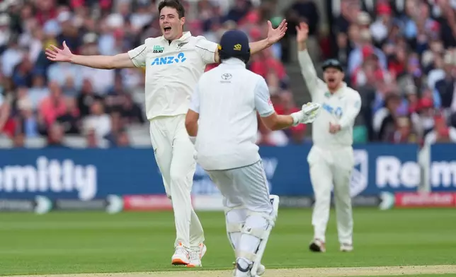 New Zealand's Will O'Rourke celebrates taking the wicket of England's Harry Brook during the second day of the test match between England and New Zealand at Lord's cricket ground in London, Friday, June 5, 2026. (AP Photo/Kirsty Wigglesworth)