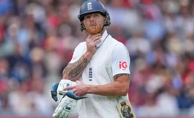 England's Ben Stokes leaves the pitch after losing his wicket during the second day of the test match between England and New Zealand at Lord's cricket ground in London, Friday, June 5, 2026. (AP Photo/Kirsty Wigglesworth)