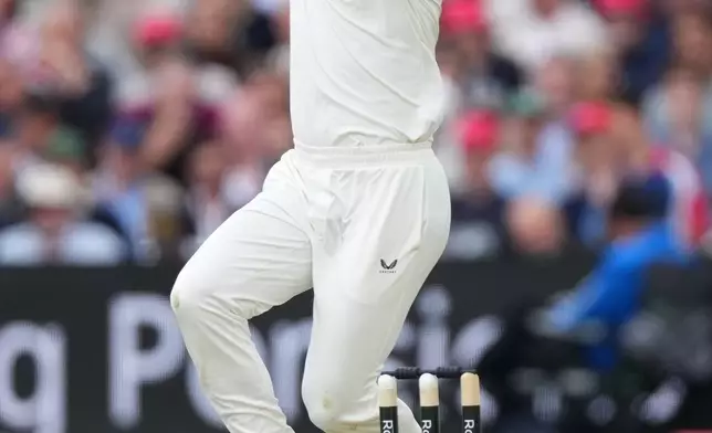 New Zealand's Matt Henry bowls during the second day of the test match between England and New Zealand at Lord's cricket ground in London, Friday, June 5, 2026. (AP Photo/Kirsty Wigglesworth)