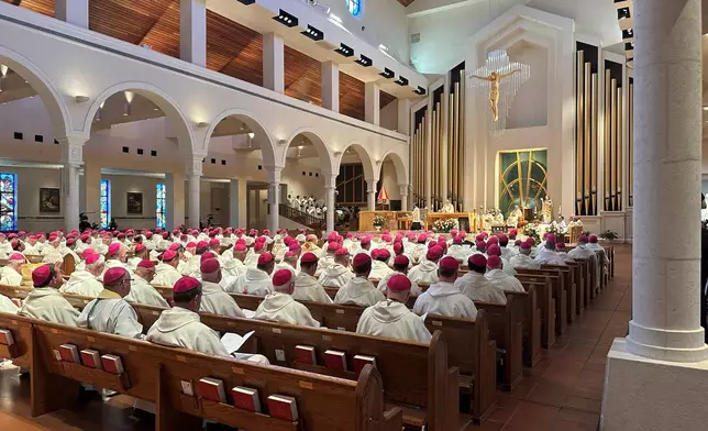 U.S. Catholic bishops are seated at the Basilica of the National Shrine of Mary, Queen of the Universe in Orlando, Fla., for a service Thursday, June 11, 2026, consecrating the United States to the Sacred Heart upon the nation's 250th anniversary. (AP Photo/Peter Smith)