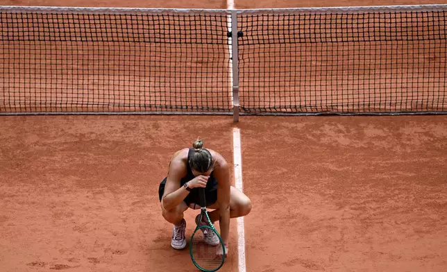 Aryna Sabalenka of Belarus reacts after losing the quarterfinal tennis match against Russia's Diana Shnaider at the French Open in Paris, Wednesday, June 3, 2026. (AP Photo/Emma Da Silva)