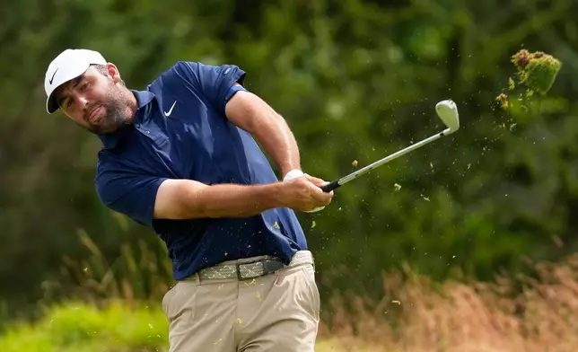 Scottie Scheffler hits his tee shot on the 11th hole during the second round of the U.S. Open golf tournament at Shinnecock Hills Golf Club in Southampton, N.Y., Friday, June 19, 2026.(AP Photo/Seth Wenig)
