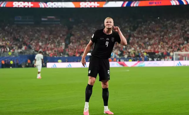 Norway's Erling Haaland (9) celebrates after scoring their third goal during the World Cup Group I soccer match between Norway and Senegal in East Rutherford, N.J., near New York, Monday, June 22, 2026. (AP Photo/Steve Luciano)