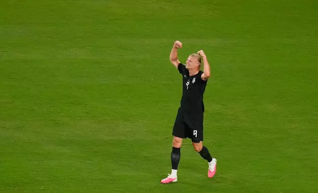 Norway's Erling Haaland (9) celebrates after scoring his side's third goal during the World Cup Group I soccer match between Norway and Senegal in East Rutherford, N.J., near New York, Monday, June 22, 2026. (AP Photo/Seth Wenig)