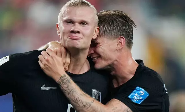 Norway's Erling Haaland, left, celebrates with David Moeller Wolfe after scoring their third goal during the World Cup Group I soccer match between Norway and Senegal in East Rutherford, N.J., near New York, Monday, June 22, 2026. (AP Photo/Steve Luciano)