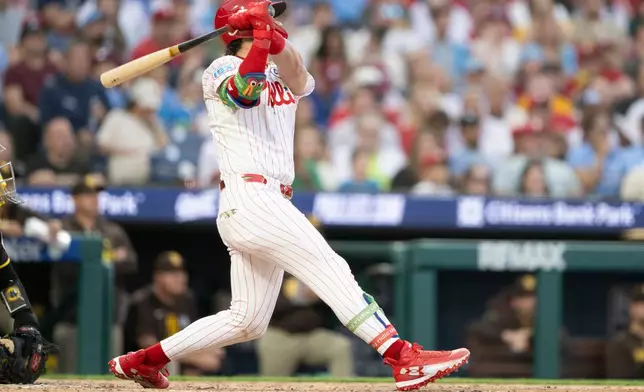 Philadelphia Phillies' Bryce Harper hits a two-run home run during the fourth inning of a baseball game against the San Diego Padres, tying the score, Tuesday, June 2, 2026, in Philadelphia. (Jose F. Moreno/The Philadelphia Inquirer via AP)