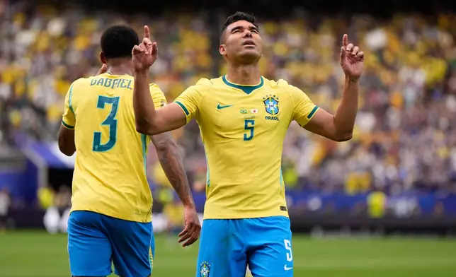 Brazil's Casemiro (5) celebrates after scoring his side's first goal during the World Cup round of 32 soccer match between Brazil and Japan in Houston, Monday, June 29, 2026. (AP Photo/Ashley Landis)
