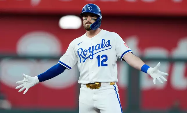 Kansas City Royals' Nick Loftin celebrates on second after hitting a two-run double during the fourth inning of a baseball game against the St. Louis Cardinals, Thursday, June 18, 2026, in Kansas City, Mo. (AP Photo/Charlie Riedel)
