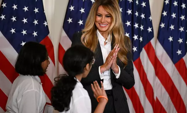 First Lady Melania Trump applauds students as she host the Inaugural Presidential AI Challenge National Champion Awards Ceremony at the White House on Tuesday, June 9, 2026, in Washington. (AP Photo/John McDonnell)