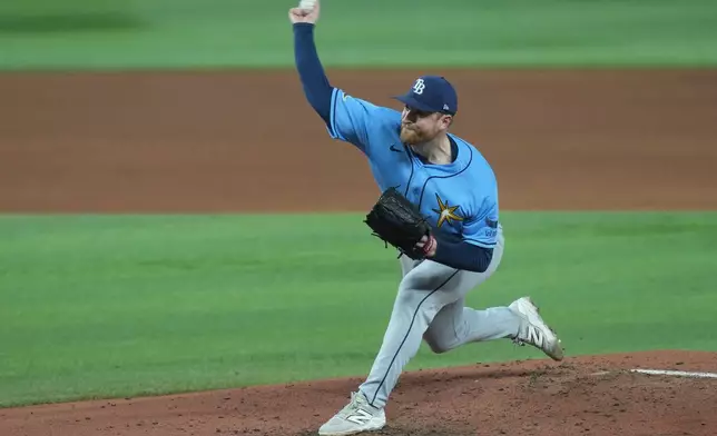 Tampa Bay Rays pitcher Drew Rasmussen aims a pitch during the fifth inning of a baseball game against the Miami Marlins Friday, June 5, 2026, in Miami. (AP Photo/Marta Lavandier)