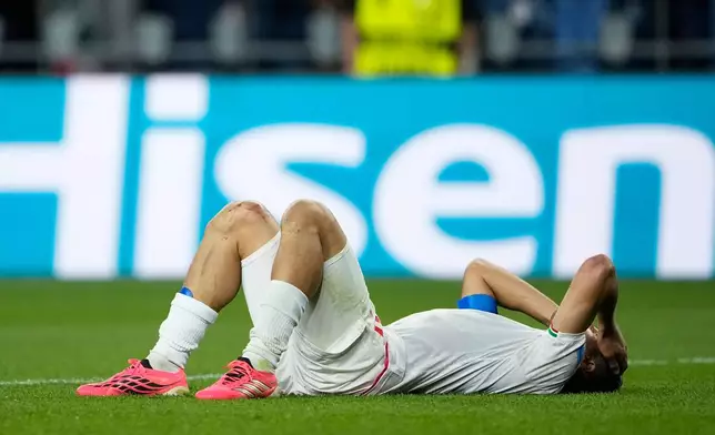 Iran's Mehdi Taremi (9) reacts at the end of the World Cup Group G soccer match between Egypt and Iran in Seattle, Friday, June 26, 2026. (AP Photo/Lindsey Wasson)