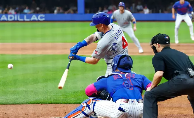 Chicago Cubs' Pete Crow-Armstrong (4) hits a three-run home run against the New York Mets during the second inning of a baseball game, Tuesday, June 23, 2026, in New York. (AP Photo/Noah K. Murray)