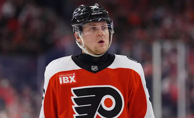FILE - Philadelphia Flyers' Emil Andrae looks on during an NHL hockey game against the Montréal Canadiens, April 14, 2026, in Philadelphia. (AP Photo/Derik Hamilton, File)