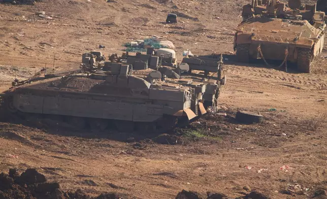 Israeli military APCs parked in northern Israel, near the border with Lebanon, Saturday, June 27, 2026 after Israel and Lebanon sign a framework agreement, described as a first step toward peace following months of conflict between Israel and the Lebanese militant group Hezbollah. (AP Photo/Ariel Schalit)