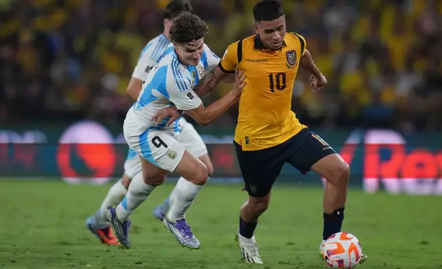 FILE - Ecuador's Kendry Paez (10) and Argentina's Julian Alvarez battle for the ball during a World Cup 2026 qualifying soccer match at Banco Pichincha stadium in Guayaquil, Ecuador, Tuesday, Sept. 9, 2025. (AP Photo/Dolores Ochoa, File)