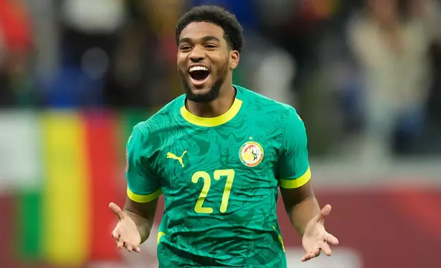 FILE - Senegal's Ibrahim Mbaye celebrates after scoring during the Africa Cup of Nations best of 16 soccer match between Senegal and Sudan in Tangier, Morocco, Saturday, Jan. 3, 2026. (AP Photo/Mosa'ab Elshamy, File)