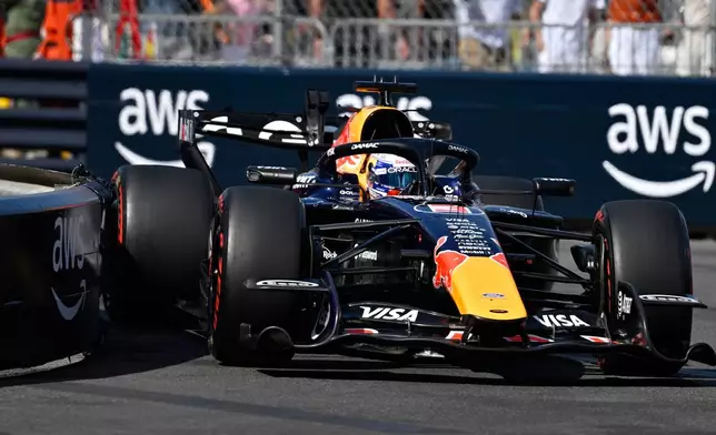 Red Bull driver Max Verstappen of the Netherlands steers his car during the qualifying session for the Monaco F1 Grand Prix, at the Monaco racetrack, Saturday, June 6, 2026. (AP Photo/Philippe Magoni)