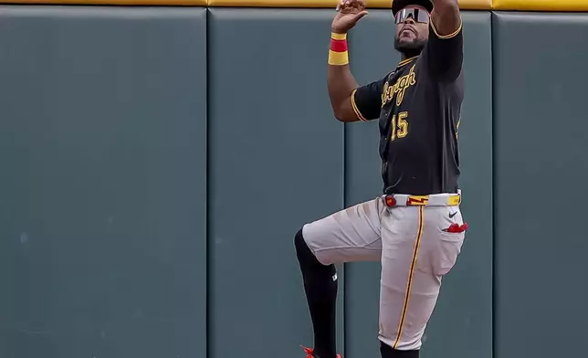 Pittsburgh Pirates center fielder Oneil Cruz catches a fly ball hit by Atlanta Braves designated hitter Dominic Smith during the third inning of a baseball game, Saturday, June 6, 2026, in Atlanta. (AP Photo/Erik S. Lesser)