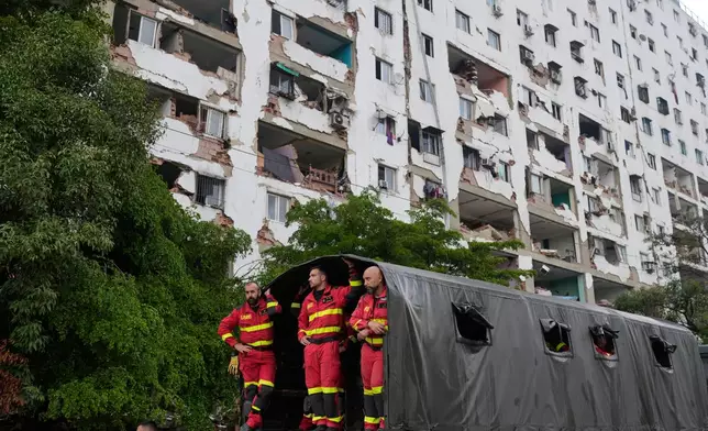 Rscuers from Spain mobilized though the area affected in the earthquakes in La Guaira, Venezuela, Tuesday, June 30, 2026. (AP Photo/Ariana Cubillos)