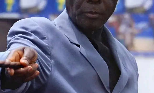 FILE - Then Benin President Mathieu Kérékou gestures during an election campaign in Ouidah, about 40 kilometers (25 miles) west of Cotonou, Benin, March 2, 2001. (AP Photo/Christine Nesbitt, File)