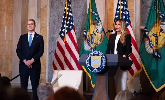 First lady Melania Trump and Treasury Secretary Scott Bessent speak about Trump Accounts for children in foster care at the Department of Treasury, Thursday, June 11, 2026, in Washington. (AP Photo/Allison Robbert)